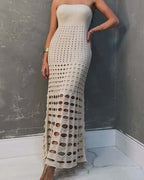 Ivory strapless maxi crochet dress with circular cutout bands and scalloped hem