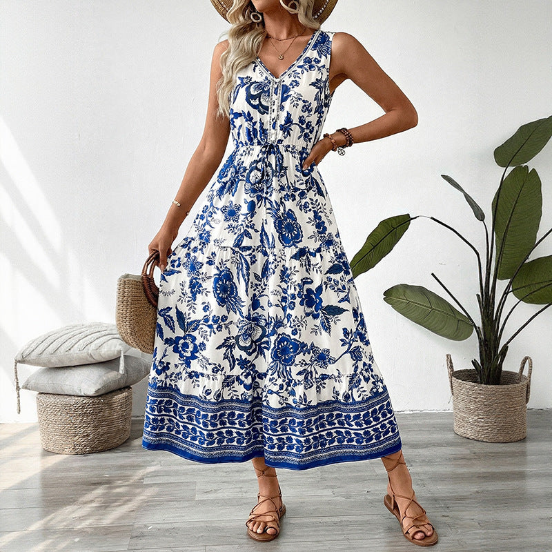Women's sleeveless summer dress, blue and white floral tiered maxi with V-neck and ruffle hem