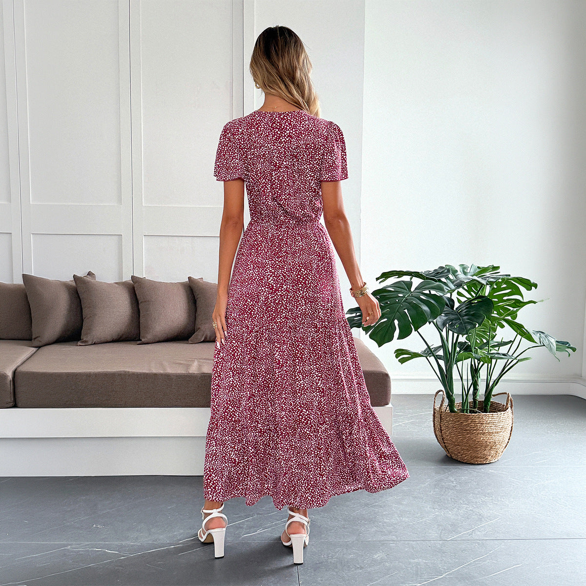 Women's burgundy polka dot maxi dress, back view, V-neck and short sleeves