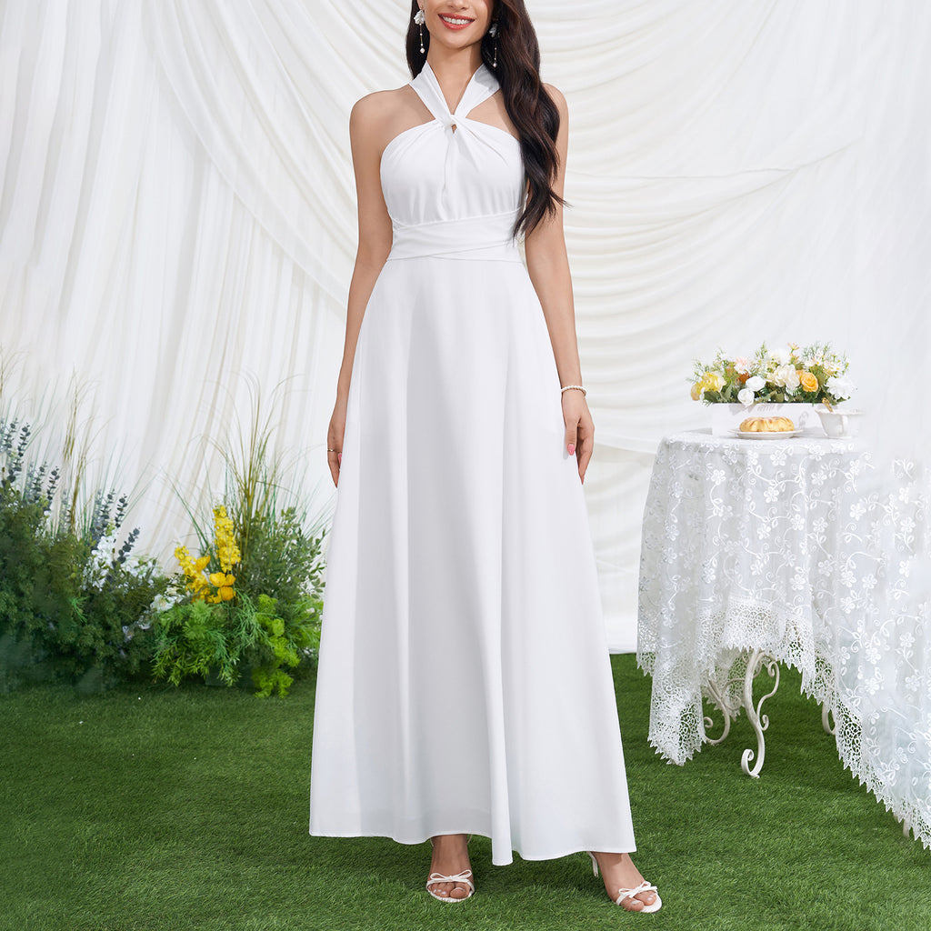 White halter maxi dress with front knot detail and flowing A-line skirt