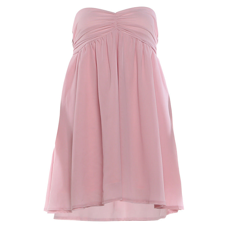 Pink strapless summer dress (back view) with gathered top and flared pleated skirt