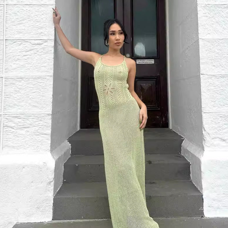 Light green crochet beach dress with spaghetti straps and openwork floral panels
