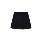 Dark swim skirt with white scalloped hem