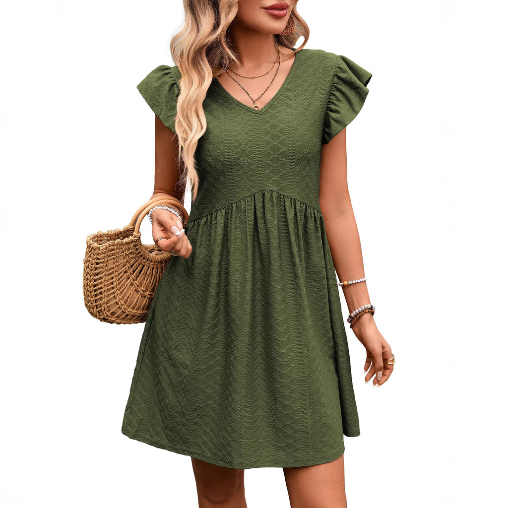 Green short sleeve V-neck babydoll dress with textured fabric and gathered skirt