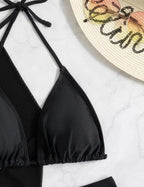 Black triangle bikini top with thin tie straps and sheer overlay
