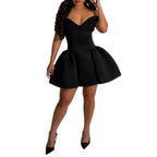 Black V-neck sleeveless fit-and-flare summer dress with pleated skirt