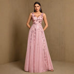 Pink sleeveless sequin evening dress, V-neck with fitted waist and full A-line skirt.