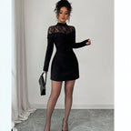 Black lace sheath dress with long sleeves, sheer lace yoke, fitted above-knee hem