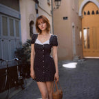 Black polka dot casual mini dress with scalloped square neckline and puff sleeves