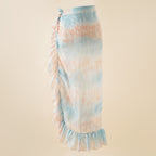 Light blue and peach tie-dye wrap beach skirt with side bow detail and tiered ruffle hem