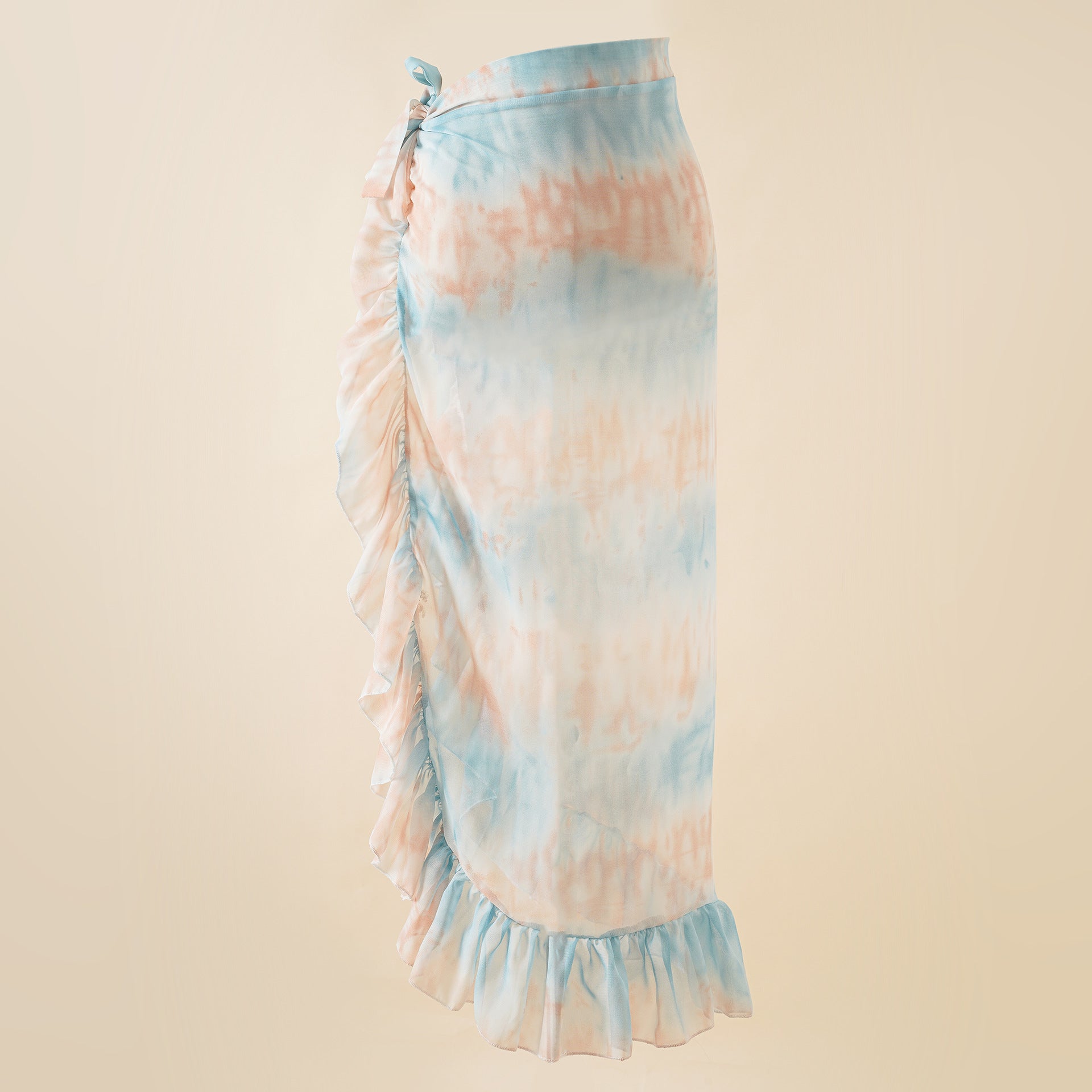 Light blue and peach tie-dye wrap beach skirt with side bow detail and tiered ruffle hem