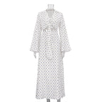Women's polka dot long-sleeve dress with V-neck tie-front and midi length
