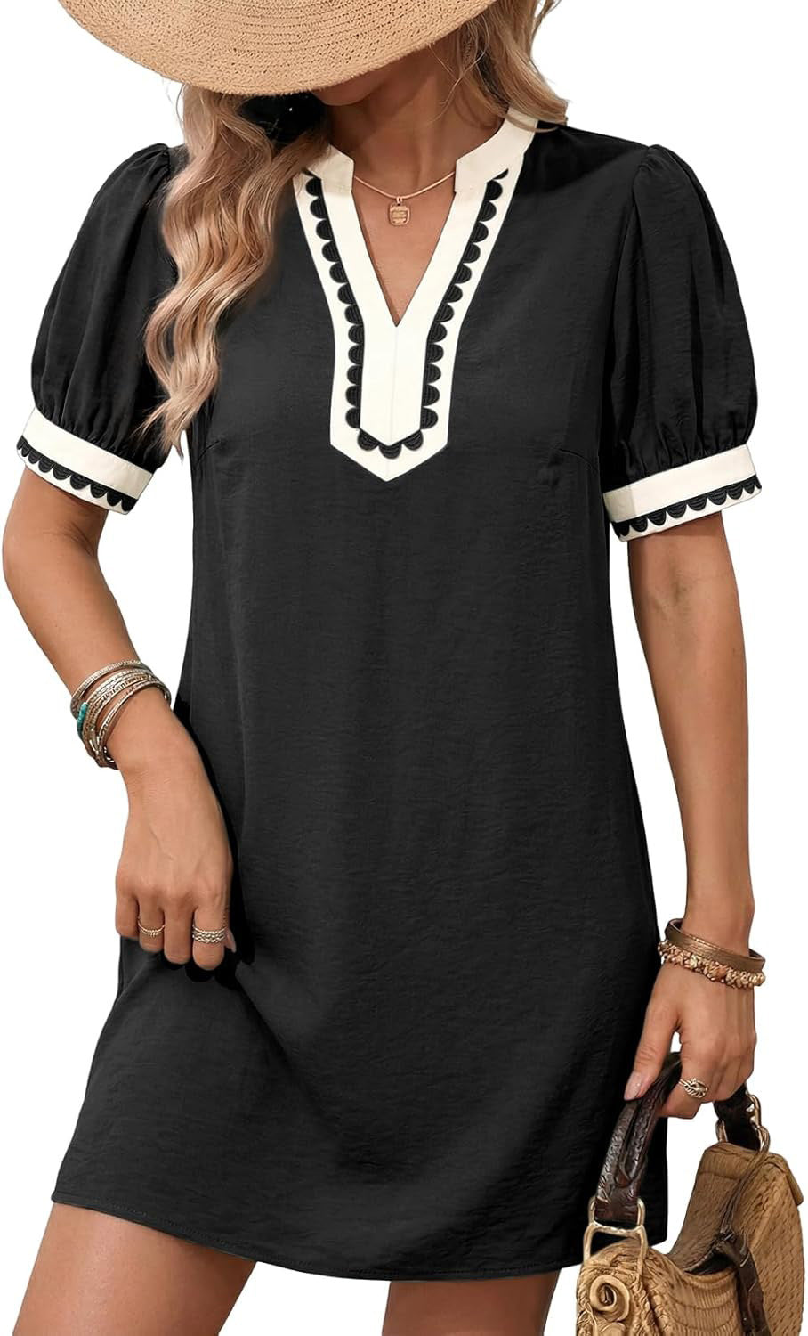 Black short sleeve dress with V-neck and white scalloped trim, puff sleeves