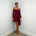 Burgundy off-shoulder long-sleeve mini dress with ruched waist and layered pleat skirt