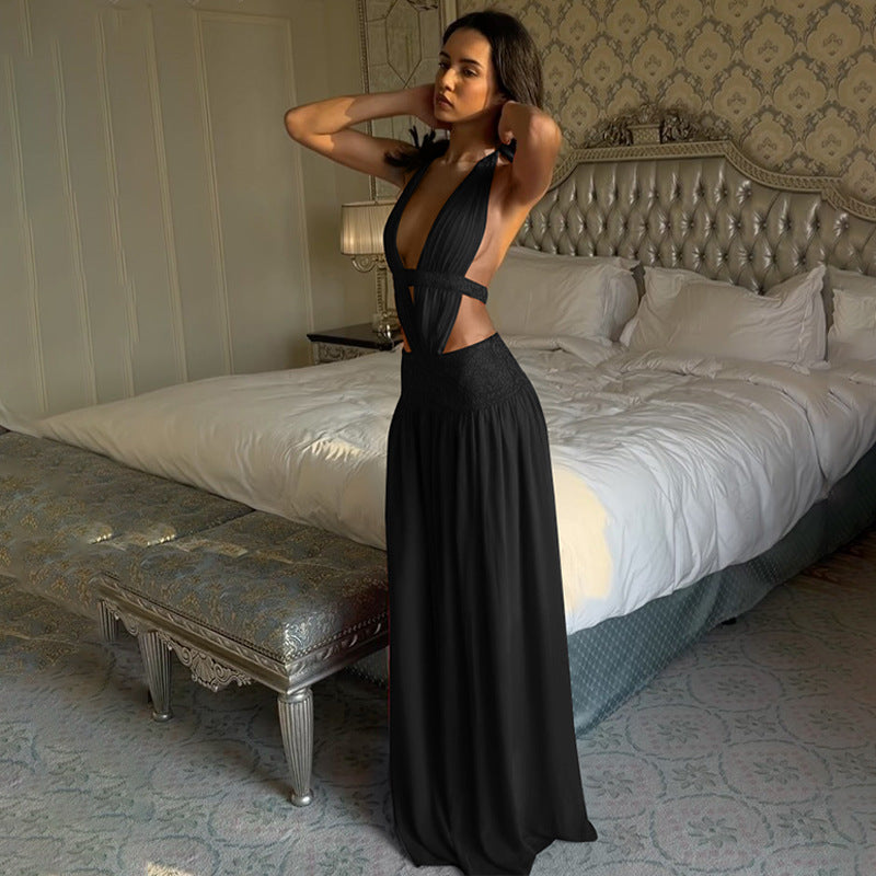 Black backless halter dress with open back and gathered skirt