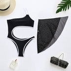 Black one-piece swimsuit with white trim and sheer mesh side panel, flat lay