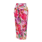 Floral long swim skirt with elastic waistband and draped, flowy silhouette