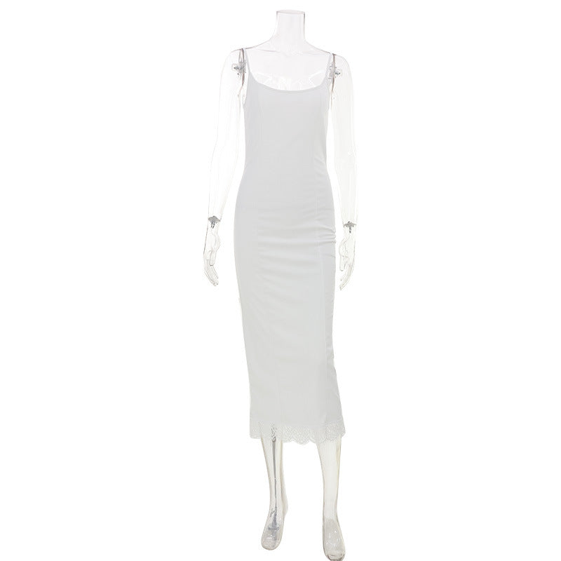 White sling dress on mannequin, spaghetti straps, lace hem