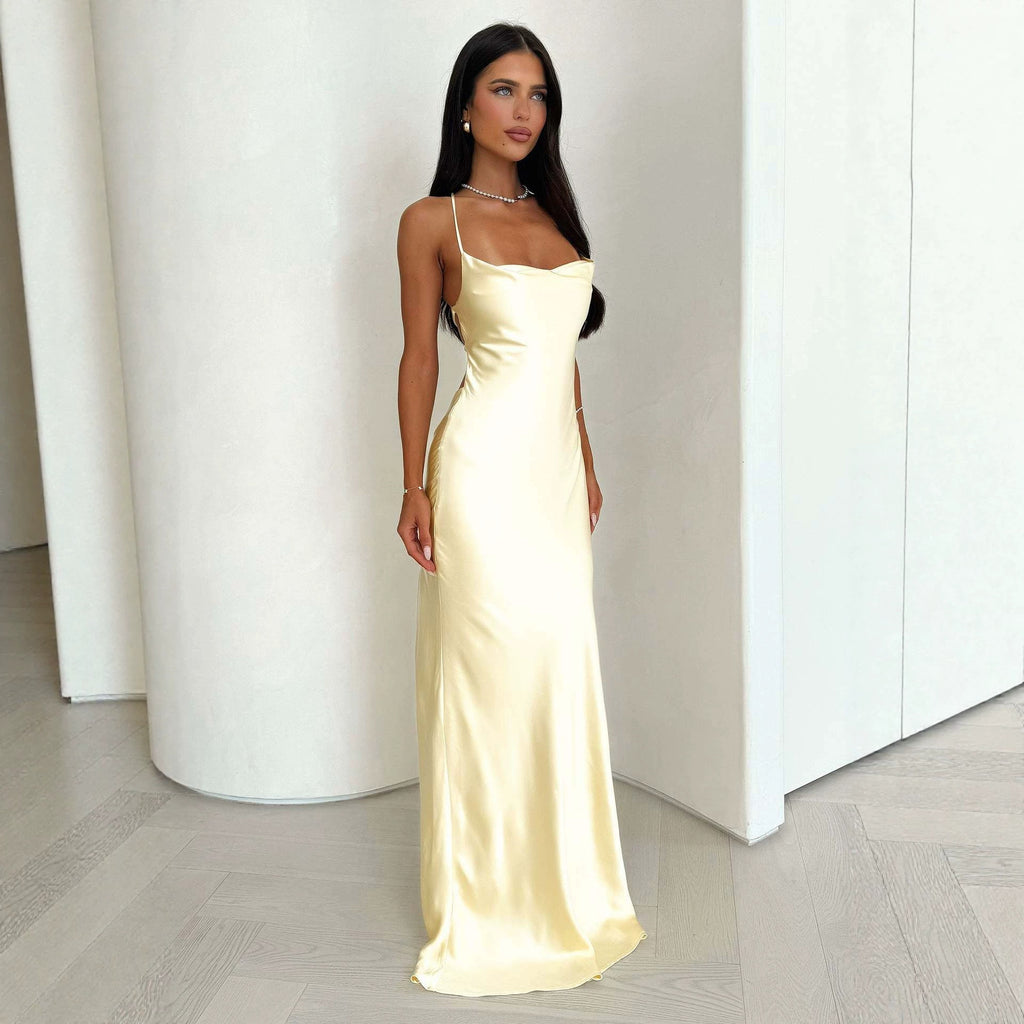 Light yellow satin slip dress, square neckline and floor-length silhouette