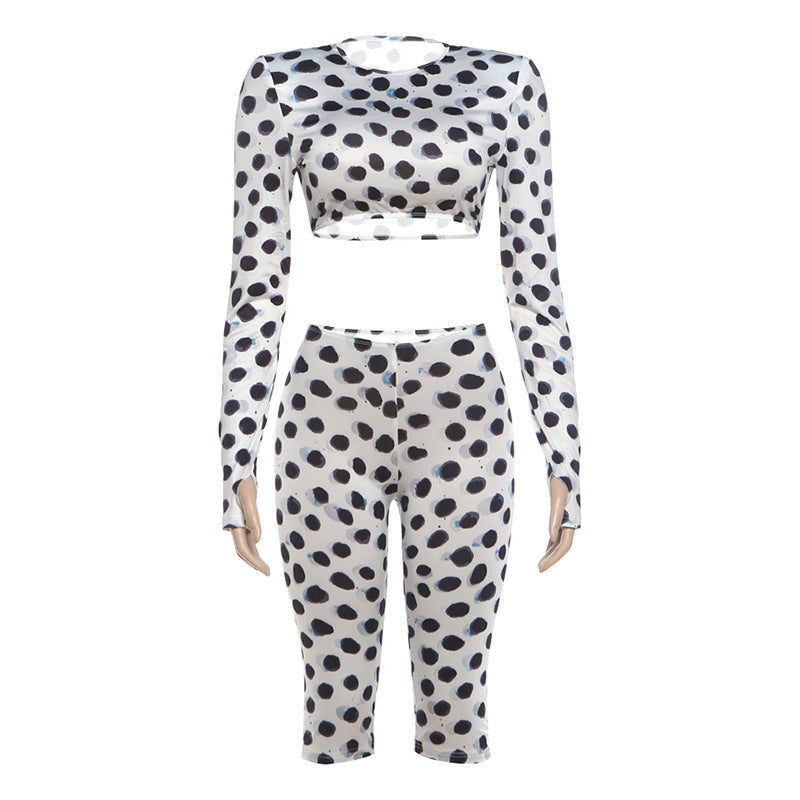 White polka dot long-sleeve crop top and capri leggings set, front view