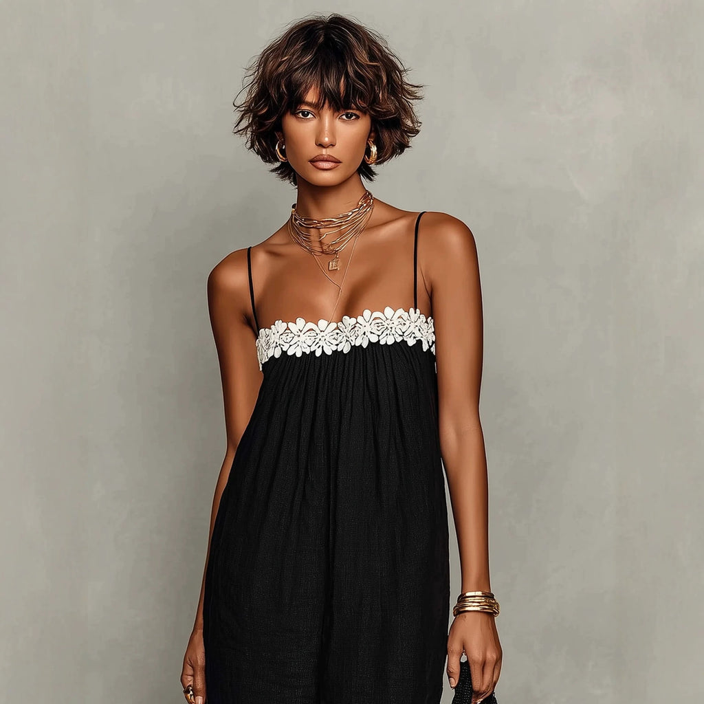 Black maxi sling dress with white lace bodice trim and thin shoulder straps