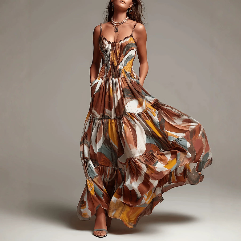 Multi-color pleated maxi dress with abstract print, spaghetti straps, tiered skirt