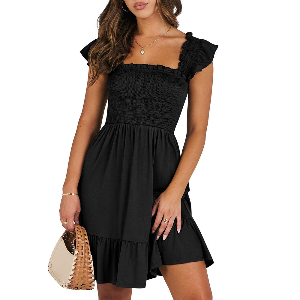 Women’s summer dress in black with smocked bodice and tiered ruffle skirt