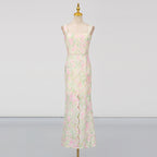 Women's maxi sleeveless dress on mannequin, pastel multi floral print, fitted bodice