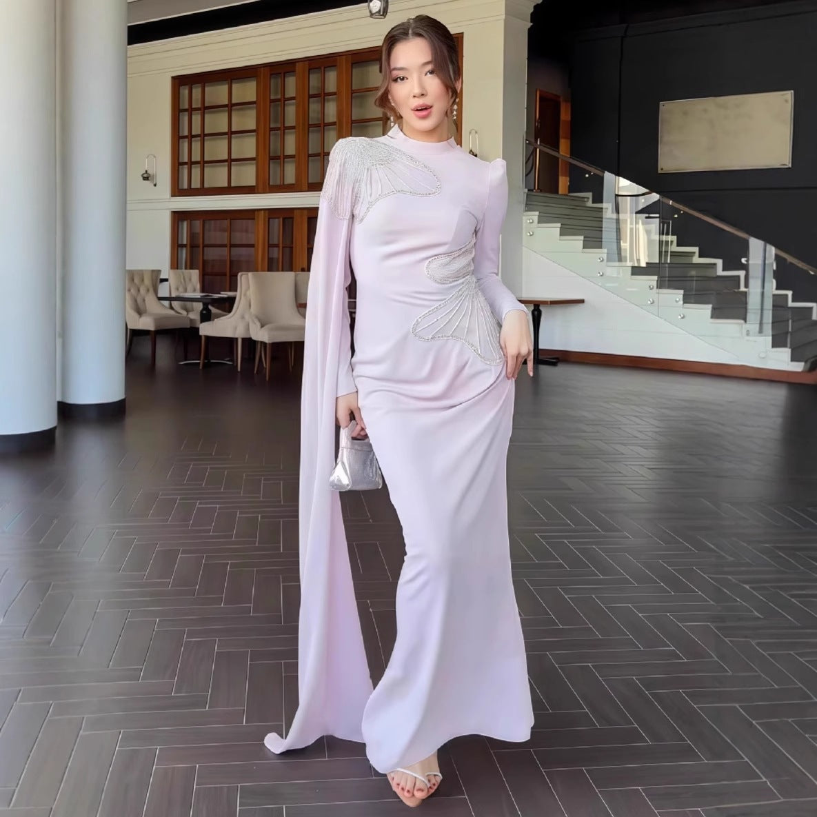 Lavender satin maxi dress with long sleeves, draped neckline, ruched waist