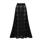 Black swim skirt with wide waistband and allover gold dot lattice pattern