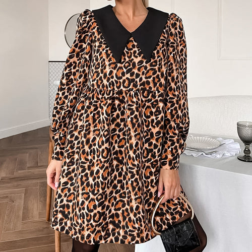 Leopard print pajama dress with black V-neck collar and long sleeves