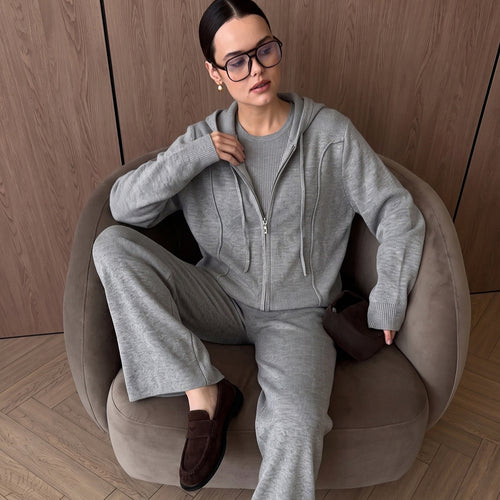 Women’s hooded zip knit cardigan in light gray with front zipper and drawstring hood