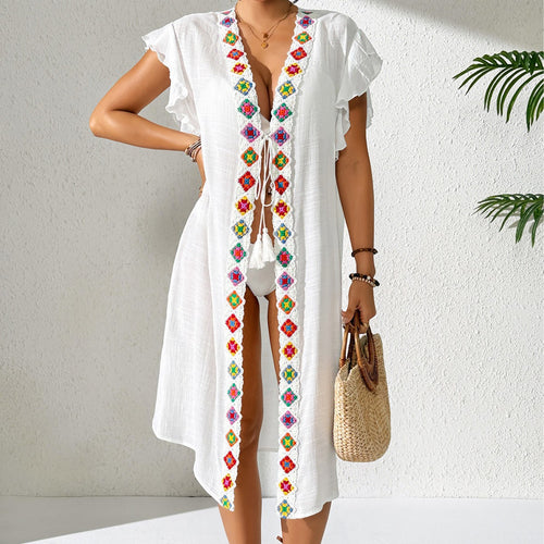 White beach cover-up with V-neck and colorful embroidered trim, flutter sleeves