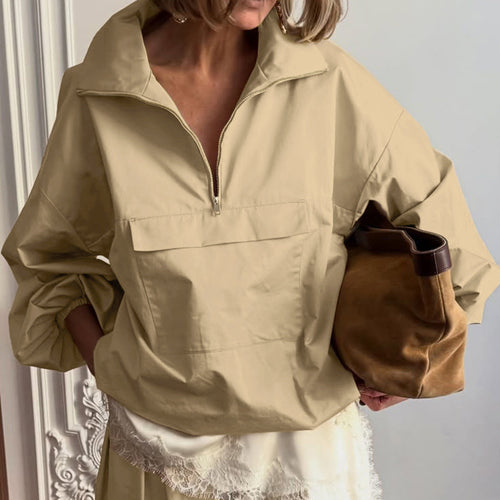 Khaki half-zip pullover with high polo collar and front pouch pocket, elastic cuffs