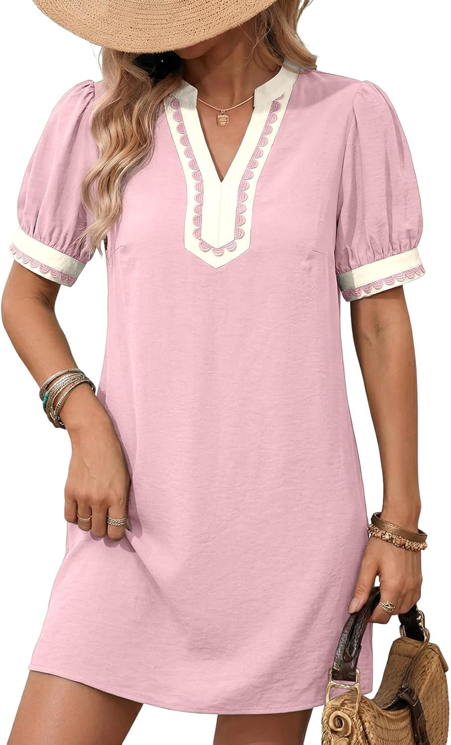 Pink short sleeve dress close-up: V-neck embroidery and scalloped white trim