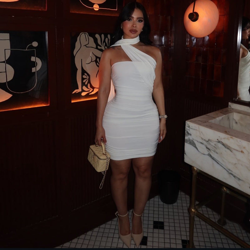 White halter mini dress with draped shoulder strap and ruched fit