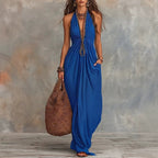 Women’s royal blue halter one-piece swimwear with gathered center and long flowing skirt