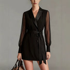 Black blazer-style mini dress with sheer long sleeves, V-neck, button front, tied waist belt