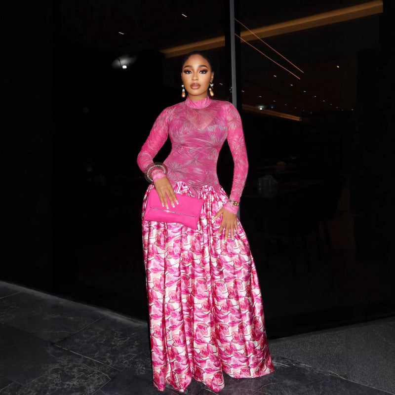 Pink floral long-sleeve maxi dress with high neckline and gathered tiered skirt