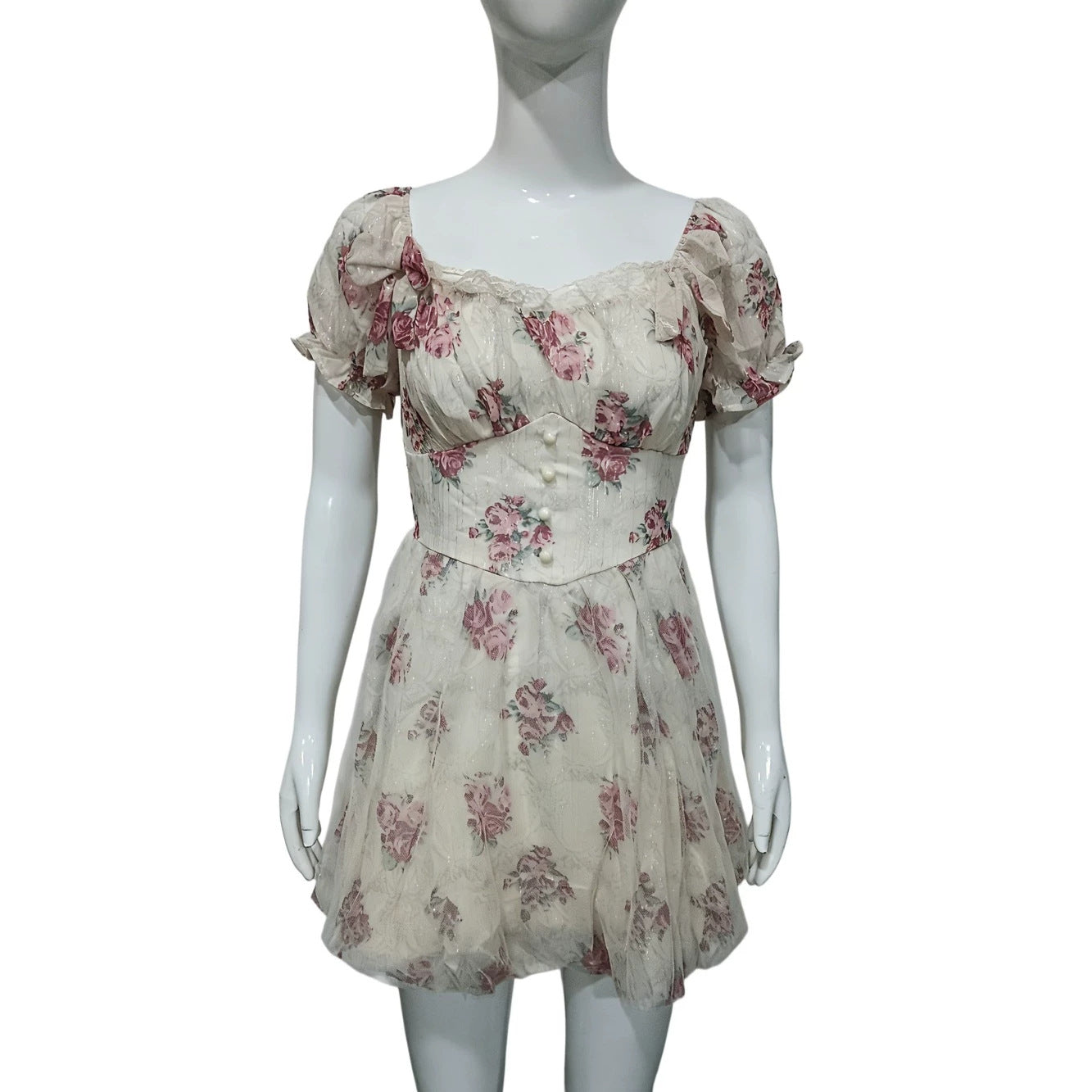 Floral lace mini dress on mannequin, puff sleeves, square neckline, cinched waist, cream