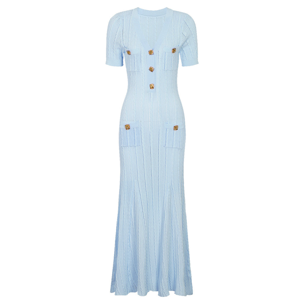Light blue maxi short sleeve dress with ribbed texture, decorative button details and patch pockets