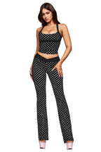 Black polka-dot halter bra and straight-leg pants set with wide waistband