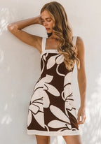 Women's mini halter dress with white-and-dark abstract floral pattern