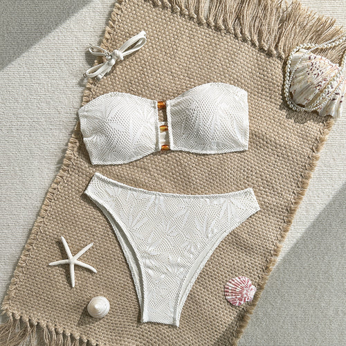Bandeau bikini set laid flat, underwired bandeau top with clasp and matching high-rise bottoms