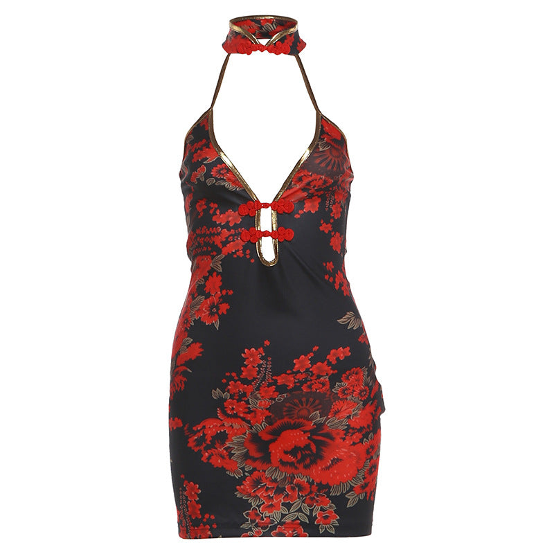 Backless halter mini dress front view, black with red floral print and gold detail