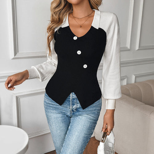 Women's fitted color-block sweater, black front with white sleeves and buttoned V-neck