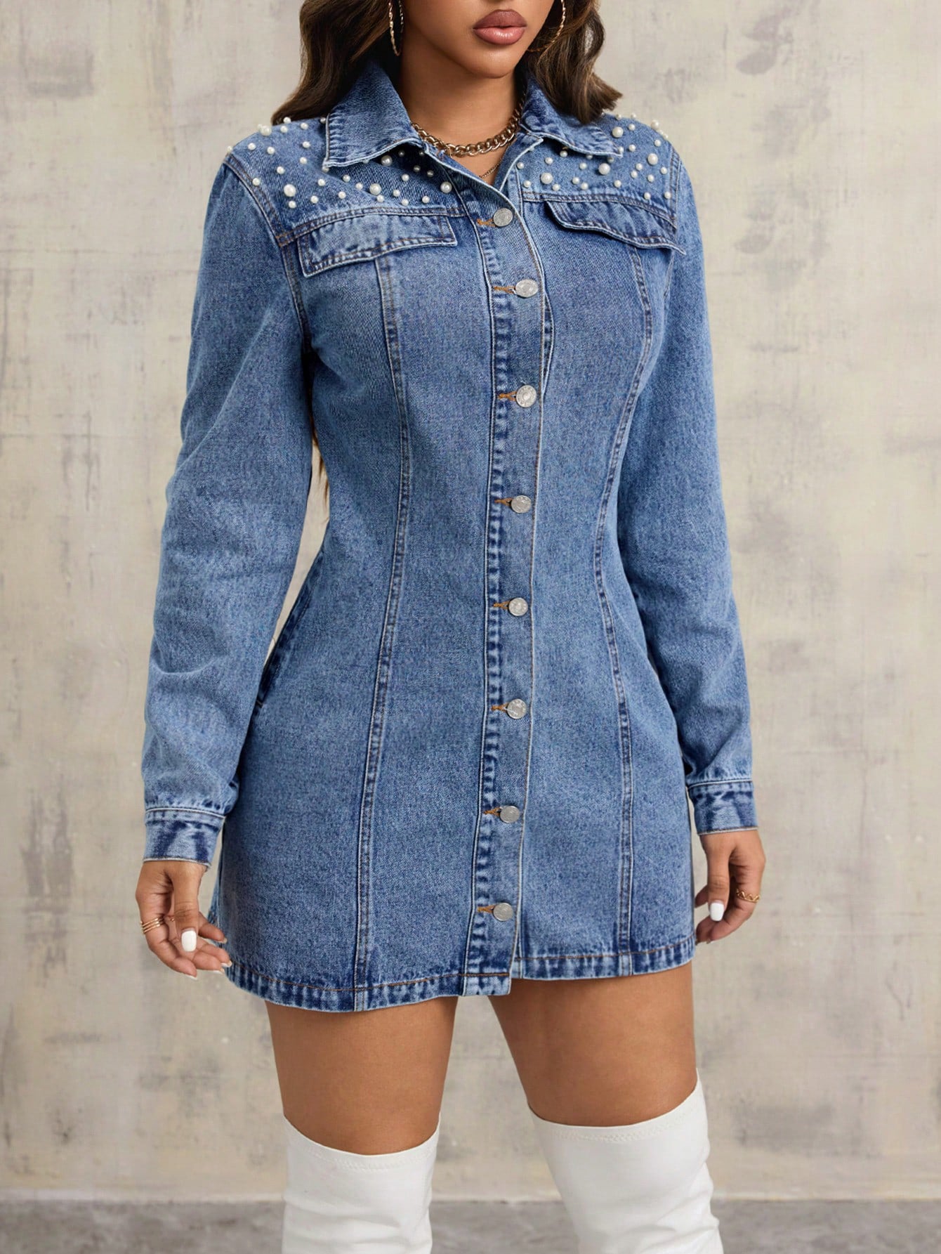 Blue denim shirt-style dress with chest pockets and button-front