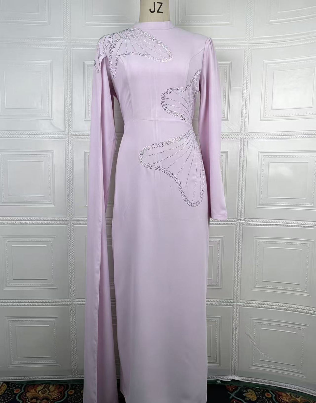 Lavender satin maxi dress with long sleeves and beaded swirl embroidery on back