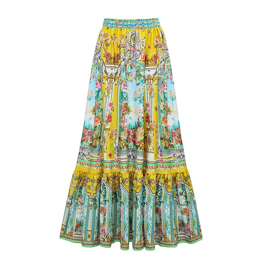 Long swim skirt in bright yellow and teal with multicolor floral paisley print