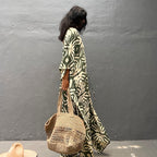 Rayon drawstring maxi dress in light green with white abstract animal print, V-neck